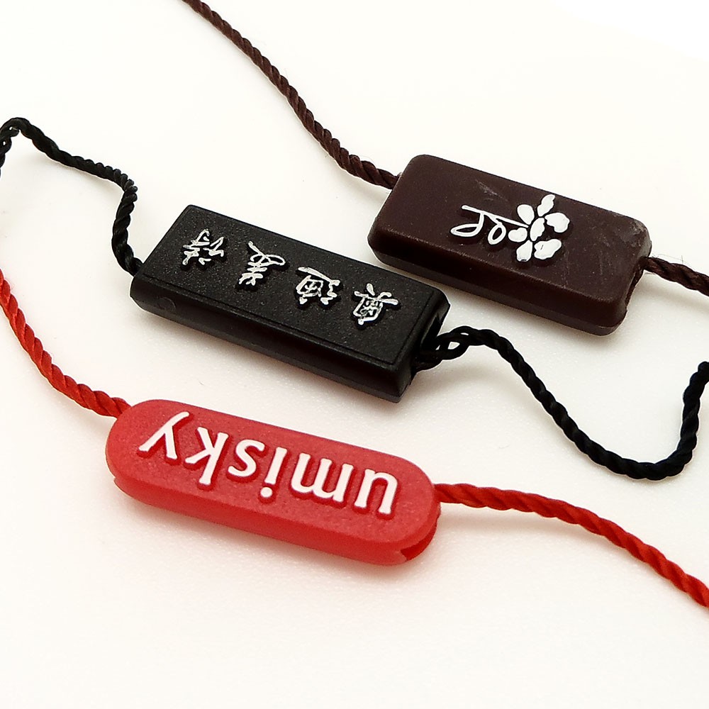 服装草莓视频污在线之吊牌吊粒